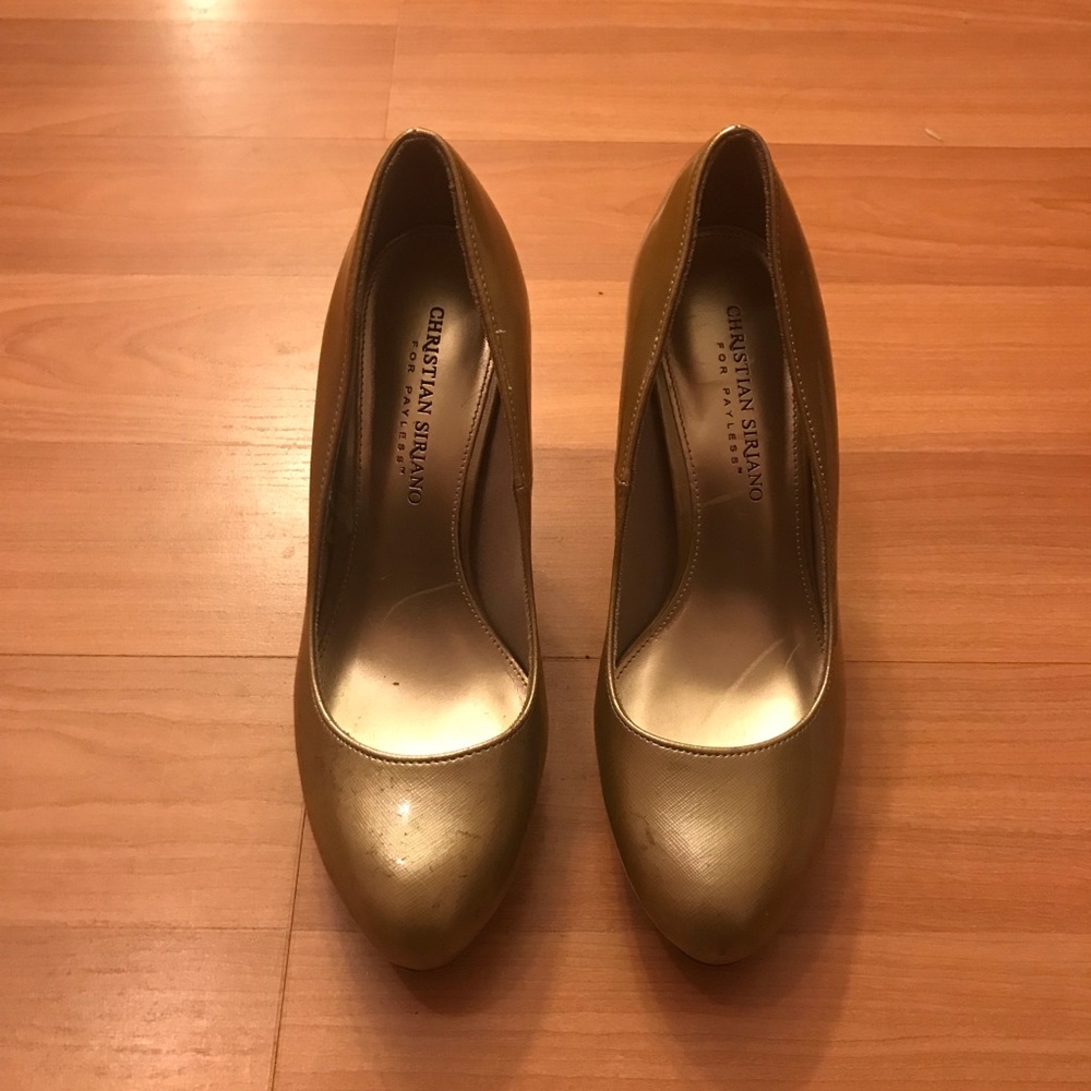 Gold heels by Christian Siriano